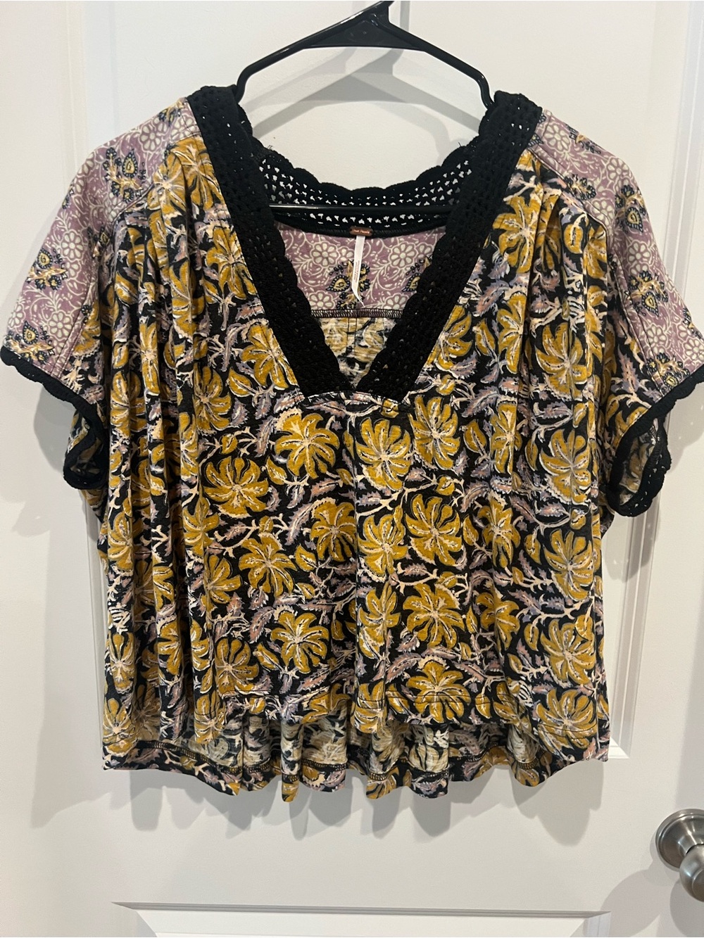Free People Leilani floral print cropped top with black crochet trim size medium